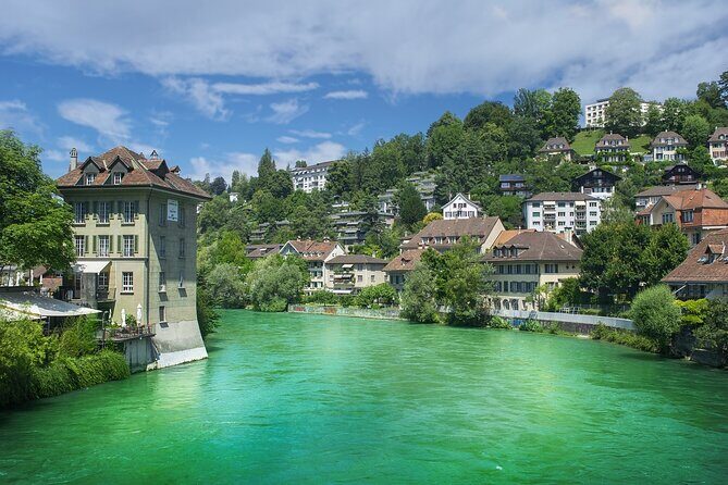 Bern Walking Tour: Explore Top Sights & Hidden Gems - Federal Palace stop: democracy in stone and symmetry