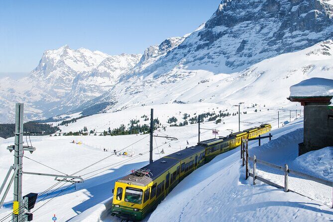 Daytrip to Jungfraujoch Top of Europe and Interlaken from Zurich - Eiger Express and Eiger North Face views: the cable car thrill step