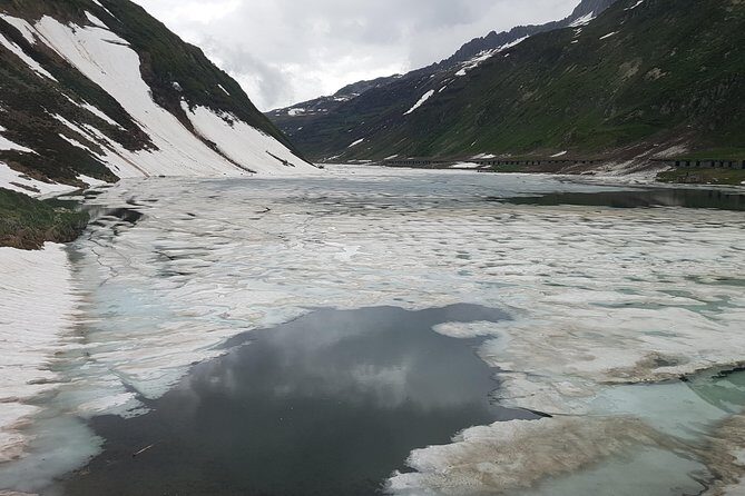 Glacier Express Panoramic Train Round Trip from Zürich With Private Guide - Oberalp Pass, tunnels, and the 2,134m high point: the route’s big payoff