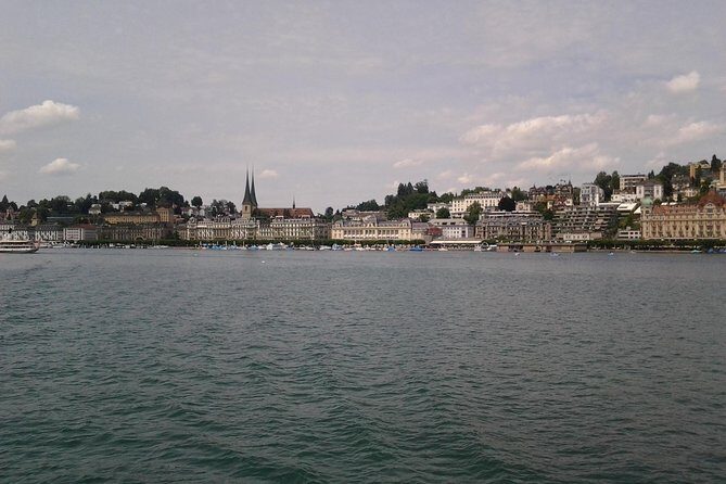 Lucerne Half-Day Small Group Walking Tour incl. Lake Cruise - Hotel des Balances: murals that turn a facade into a landmark