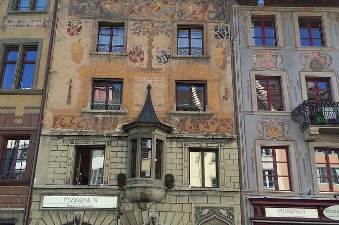 Private Classic Lucerne City Walk - Hirschenplatz and Kornmarkt: Medieval Houses and a Clock That Skips Minutes