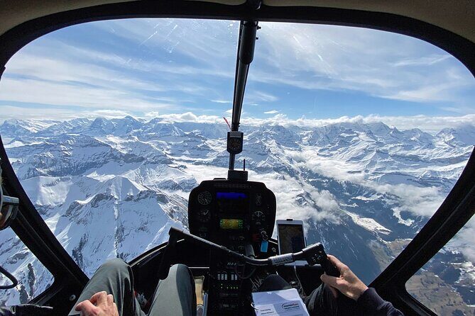 Private Swiss Alps helicopter tour over snow covered mountain peaks and glaciers - Schilthorn, the 007 Connection, and the Lauterbrunnen Cable Car View