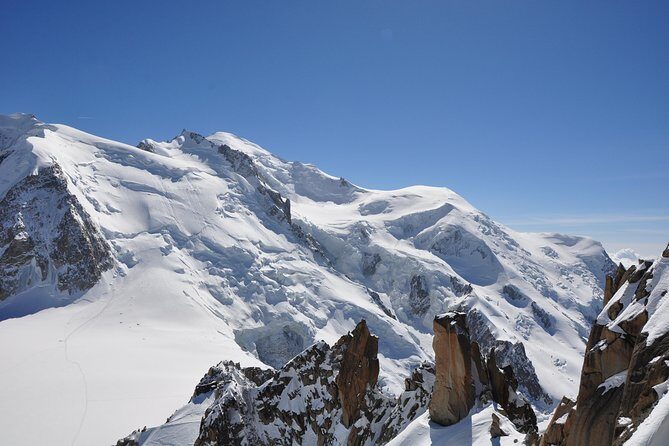 Private Transport to Chamonix from Geneva with driver-guide - Chamonix streets and Mont Blanc views: a charming base before the heights