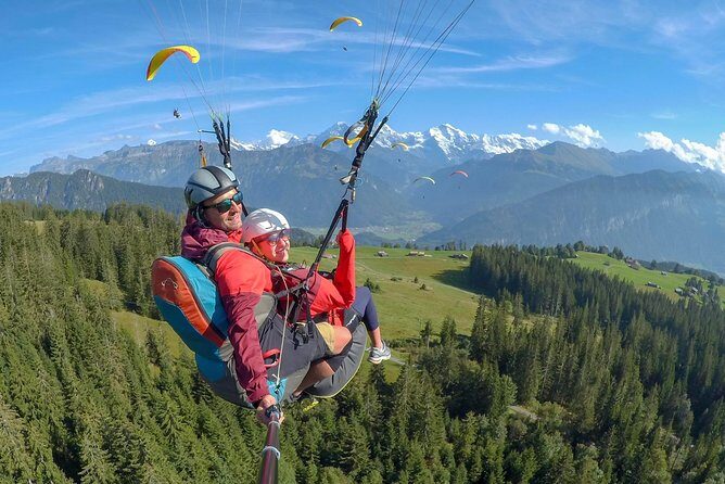 Tandem Paragliding Experience from Interlaken - Takeoff at the foothills: that first run and the switch into air