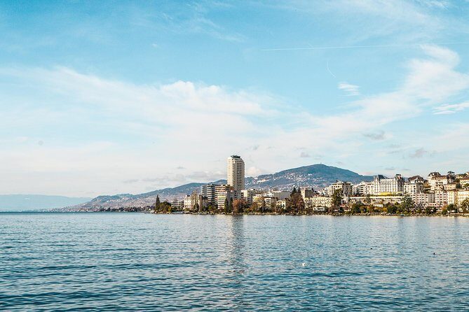 Vevey, Montreux, Chillon Day Trip from Geneva - Quick icons near the water: Chaplin, the fork, and Freddie Mercury