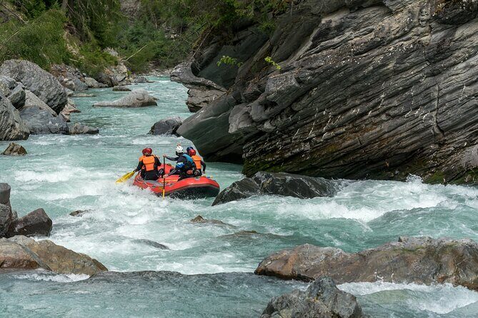 Whitewater Action Rafting Experience in Engadin - Before the gorge: Helmet-on, commands-first