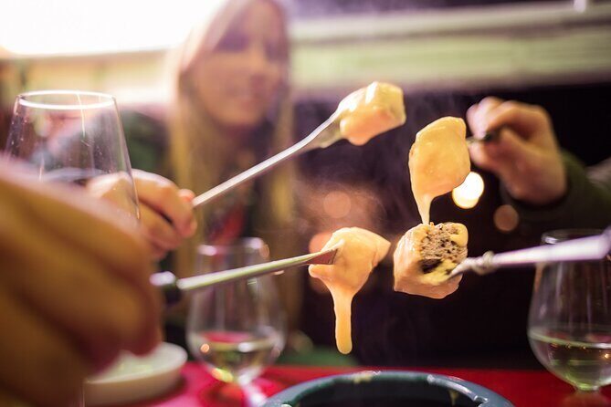 Zurich eTukTuk Private Tour - with Cheese Fondue and Wine - The fondue and wine moment: how the meal fits into the tour