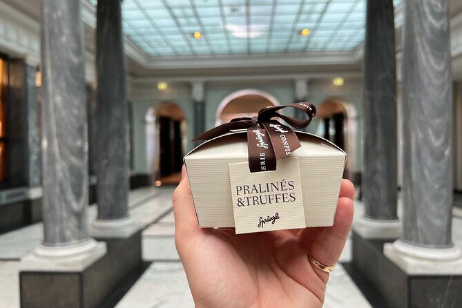 Zurich Food Tour with 10 Local Delicacies, Cheeses & Chocolates - Fraumünster and St. Peter’s Church: stained glass views and the clock that dominates the street