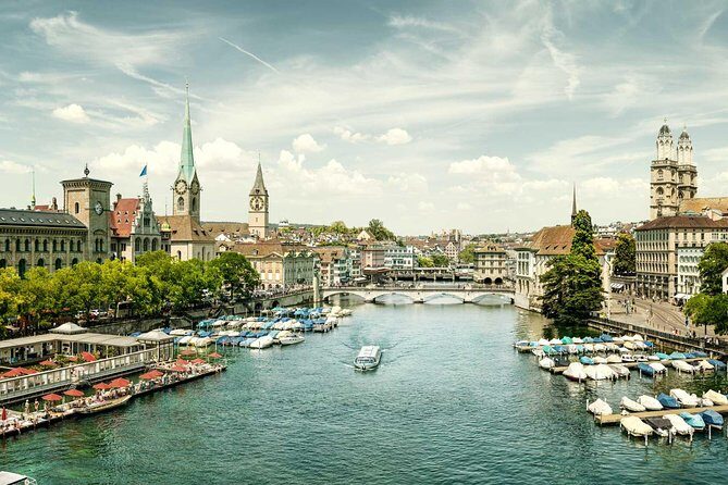 Zurich Sights: Cruise, Lindt Chocolate and optional FIFA Ticket - Old Town Altstadt: Guild Houses, St. Peter’s Clock, and Fraumünster